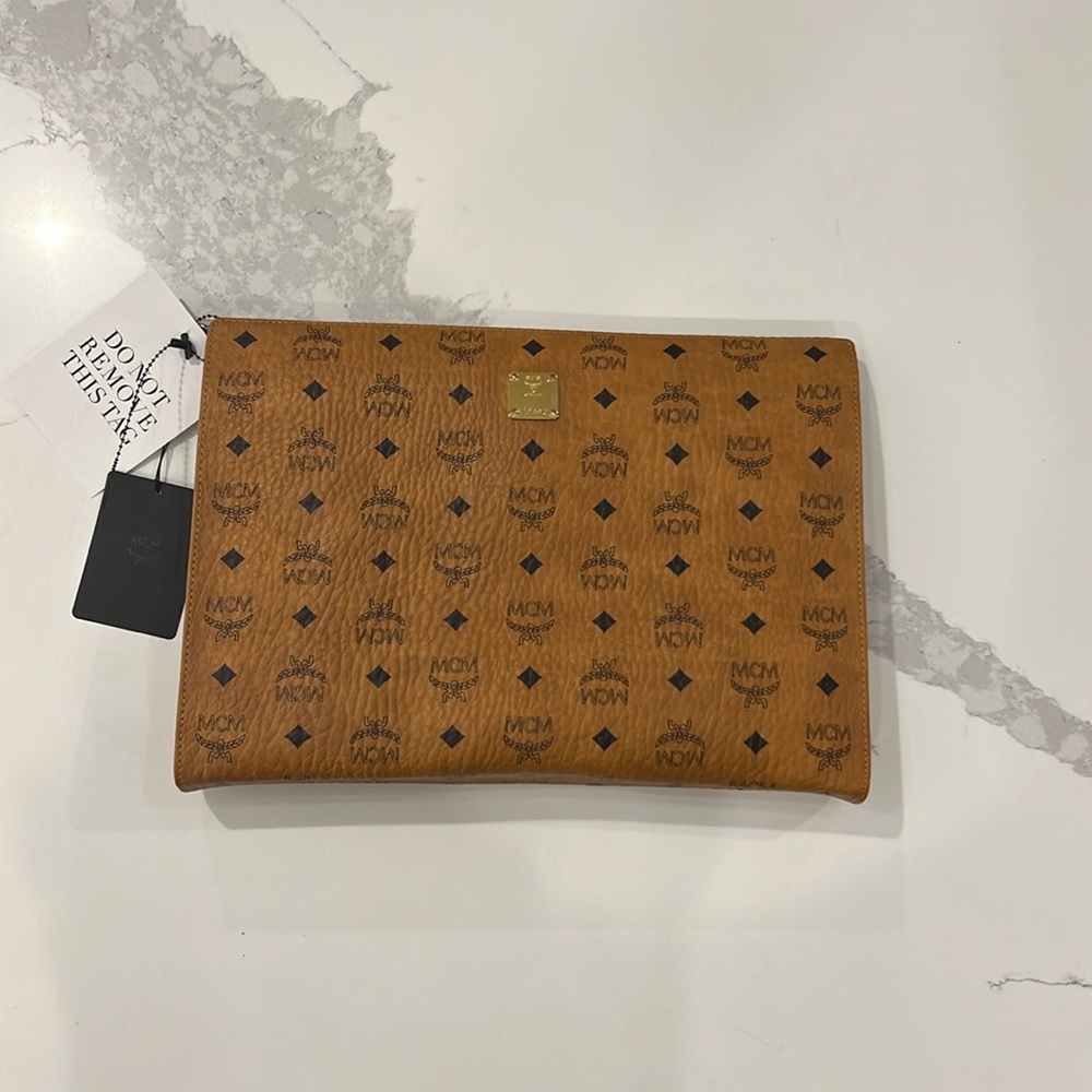 Brand new MCM standing pouch / laptop sleeve / iPad pouch  in visetos original